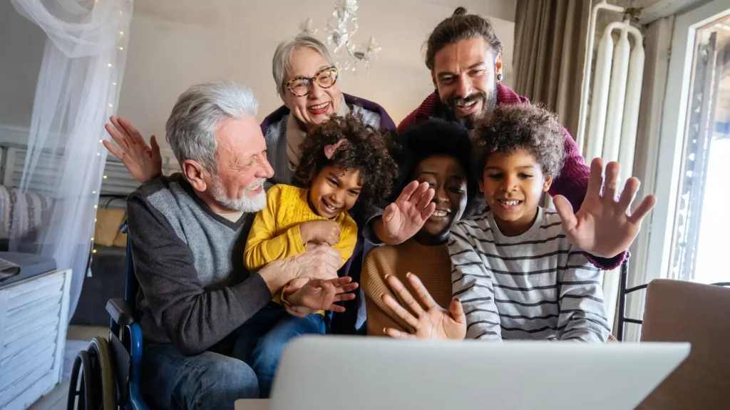 Extended multiethnic family together at home during video call. People happiness technology concept